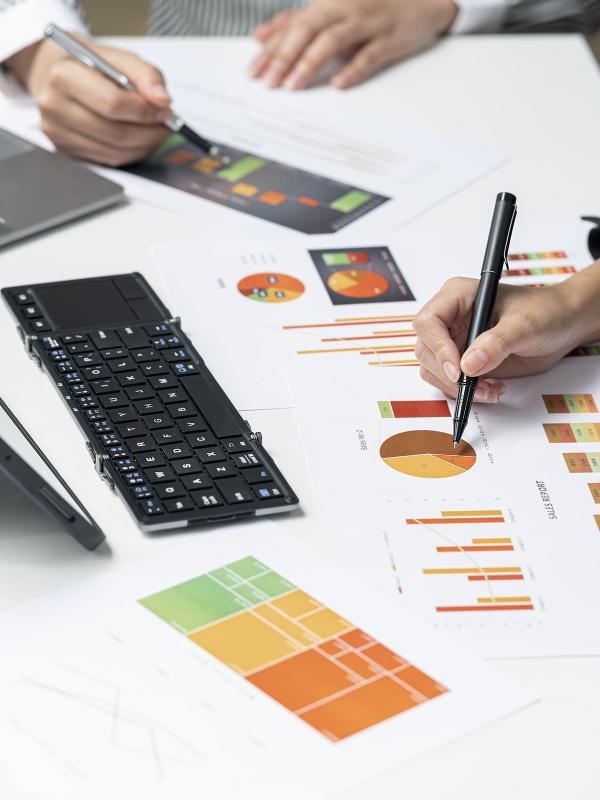 business-people-hands-working-on-graph-and-chart-o-2024-12-06-21-49-31-utc